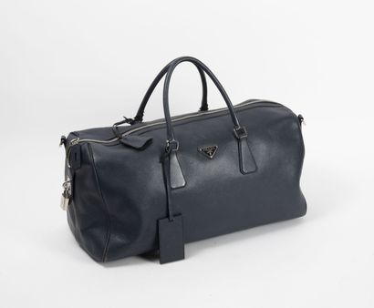 PRADA
Dark blue grained leather bag. 

Double...