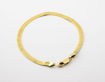 Yellow gold (750) bracelet with flat flexible...