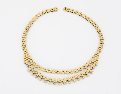 Yellow gold (750) and platinum (850) drapery...