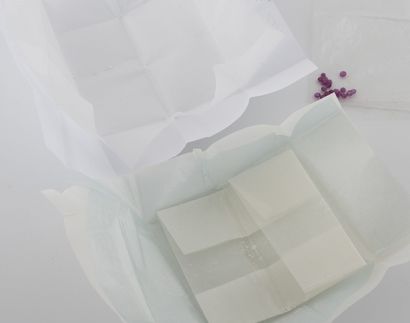 Lot of diamonds and synthetic rubies on paper....