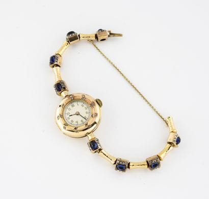 Yellow gold ladies' wristwatch (585).

Round...