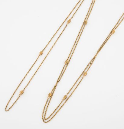 Long necklace in yellow gold (750) with fancy...