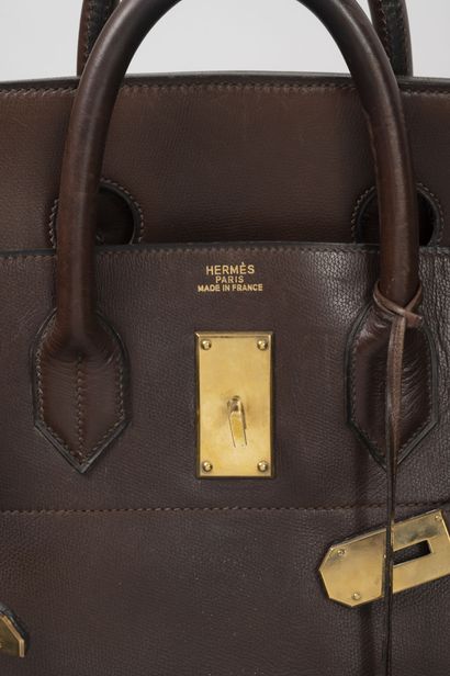 HERMES, France
Top strap bag, 55 cm, in dark...