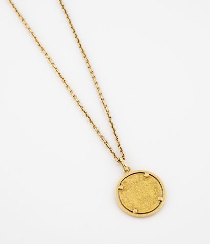 Yellow gold (750) chain with a 20 francs...