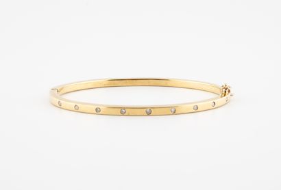 Yellow gold (750) and small diamonds in closed...