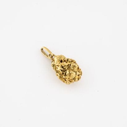 Yellow gold (750) nugget pendant.

Weight...