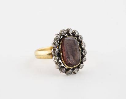 Bague en or jaune (750) et argent (min.800)...
