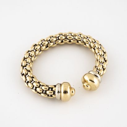 Bracelet in yellow and white gold (750) braided....