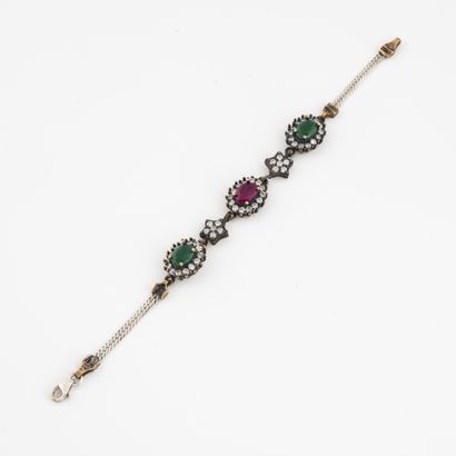Bracelet en argent (min.800) et or jaune...