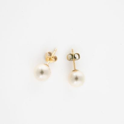 Paire de puces d'oreilles en or jaune (750)...