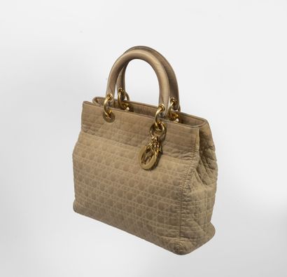 Christian DIOR, Lady Dior
Sac en tissu beige...