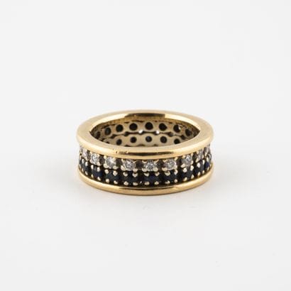 Bague bandeau en or jaune (750) ornée de...