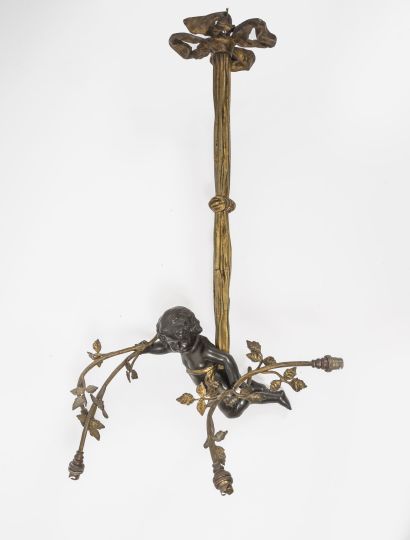 A bronze chandelier with a gilt and brown...