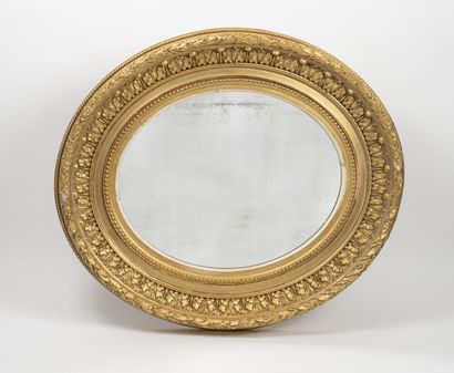 Miroir moderne dans un à cadre ovale, de...