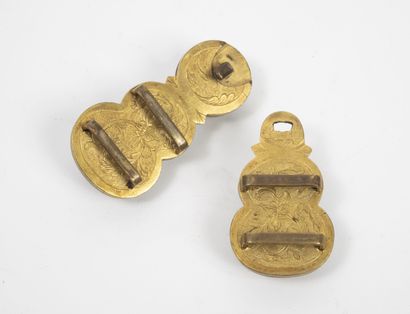 CHINE, XIXÈME SIÈCLE
Celadon jade belt buckle,...
