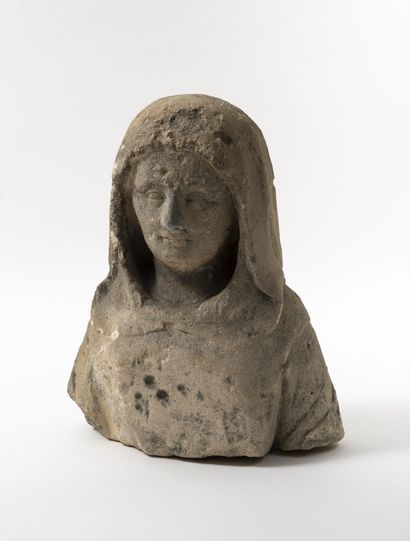 Bust of a holy woman with a veil. 

Limestone...