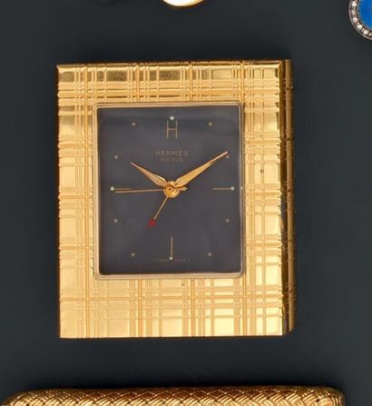 HERMÈS Paris
Réveil de voyage en métal doré...