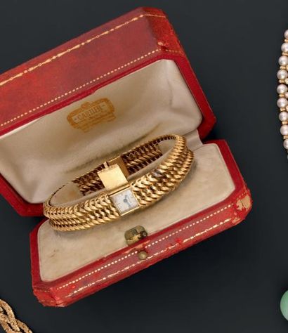 CARTIER et JAEGER LECOULTRE
Bracelet en or,...