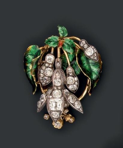 Elément de broche en or jaune et argent émaillé...
