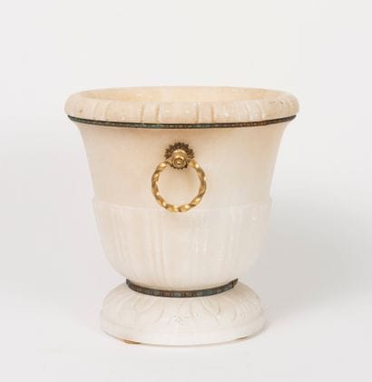 Two pieces of white alabaster form, from...