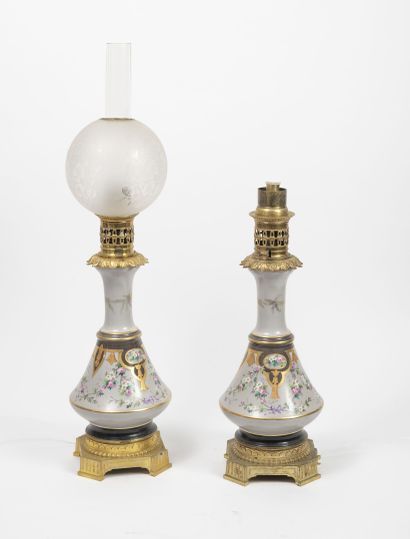 Pair of oil lamps, with baluster-shaped porcelain...