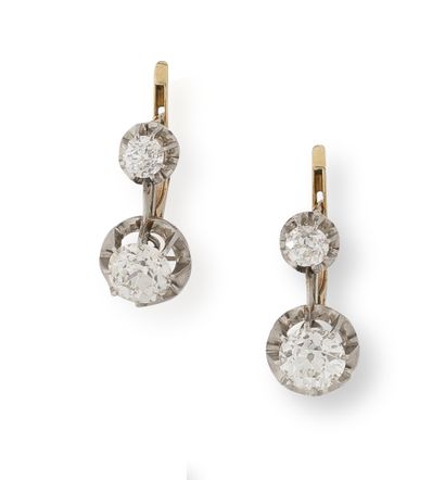 A pair of yellow gold (750) and platinum...