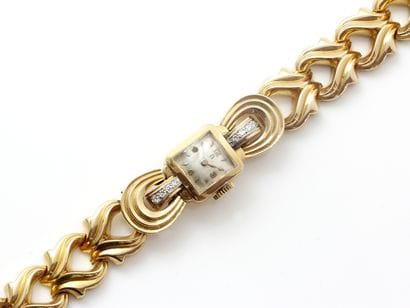 OMEGA
Ladies' wristwatch in gold (750). 

Stained...
