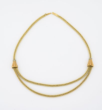 Yellow gold (750) necklace with a flat palm...
