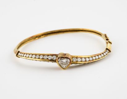 
Yellow gold (585) bangle bracelet with a...