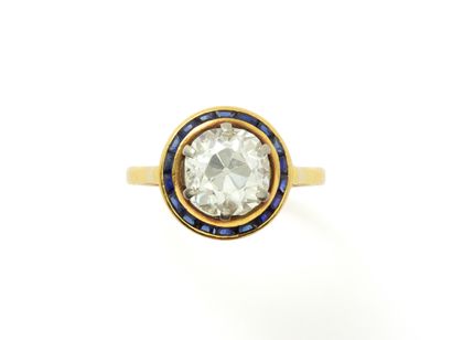 Gold (750) and platinum (850) ring, set with...