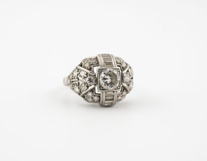 
A platinum (850) dome ring centered on a...