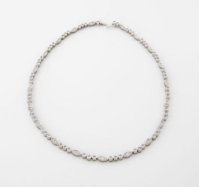CARTIER
Articulated necklace in platinum...