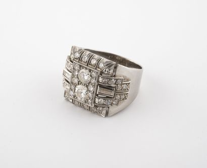 A platinum (850) signet ring with a square...