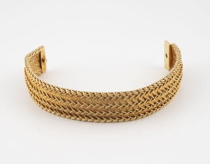 Yellow gold (750) ribbon bracelet with a...