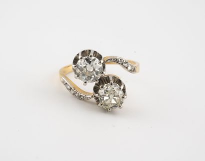 A yellow gold (750) and platinum (850) ring...