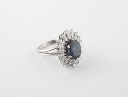 White gold (750) flower ring centered on...