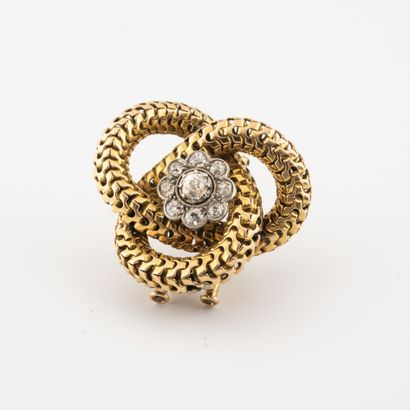 MELLERIO
Yellow gold (750) lapel clip with...