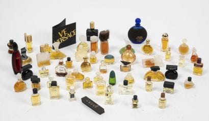 Set of about 40 full or empty bottles of...