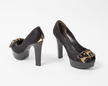 LOUIS VUITTON
Pair of black colt pumps, leopard...
