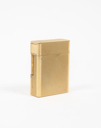 S.T.Dupont
Lighter in gilded metal with a...