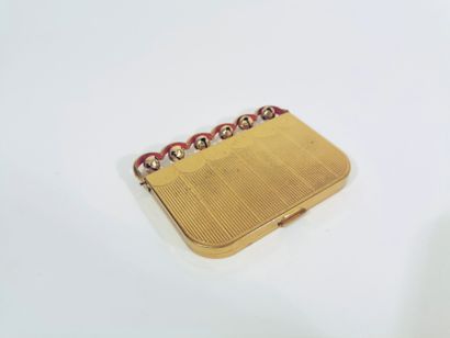 Coty
A gilt metal compact with bells, stamped...