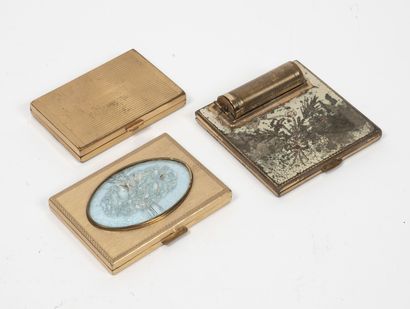 ELISABETH ARDEN ou autres 
Three gilt or...