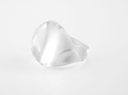 Dome-shaped translucent glass ring. 

Finger...