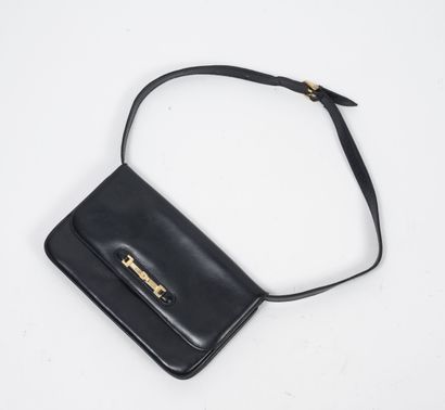 CELINE
Small navy blue leather bag. 

Snap...
