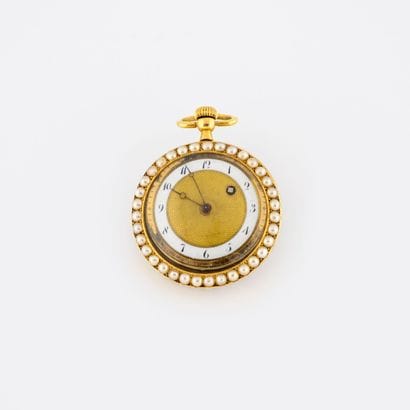 Montre de col en or jaune (750).

Couvercle...