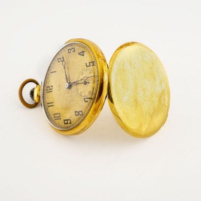 Montre de gousset en or jaune (750).

Couvercle...