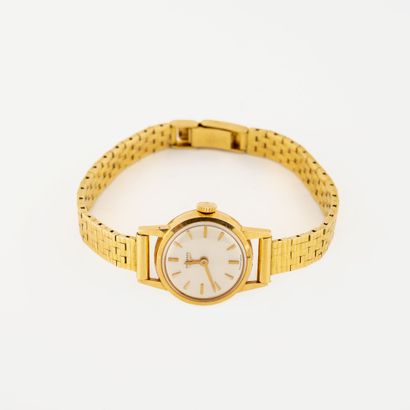 LONGINES
Montre bracelet de dame en or jaune...