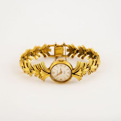 Montre bracelet de dame en or jaune (750)...