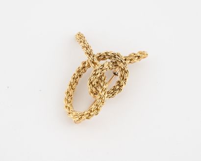Yellow gold (750) knot brooch. 

Pin in yellow...