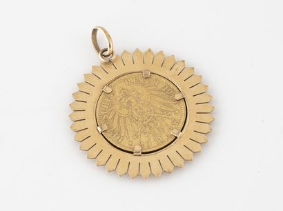 Pendentif en or jaune (750) retenant une...